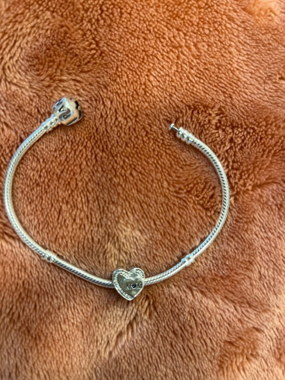 Pandora bracelet with a  Heart Mom charm